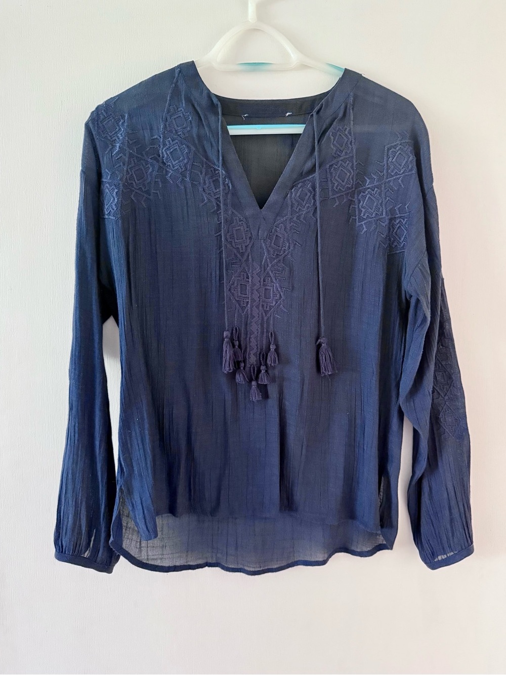 Bohemian flowy linen top with tassel & embroidery details